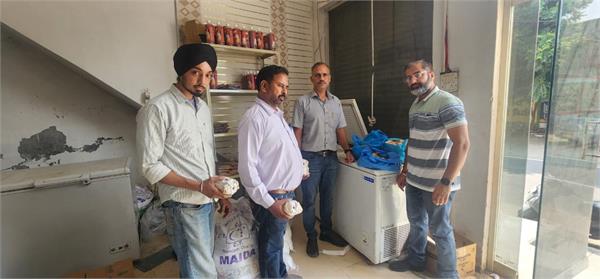 health team collects samples of food items in tanda