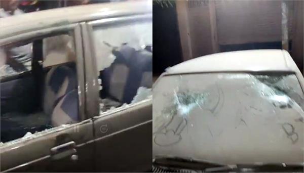 glass of a car parked outside a house broken