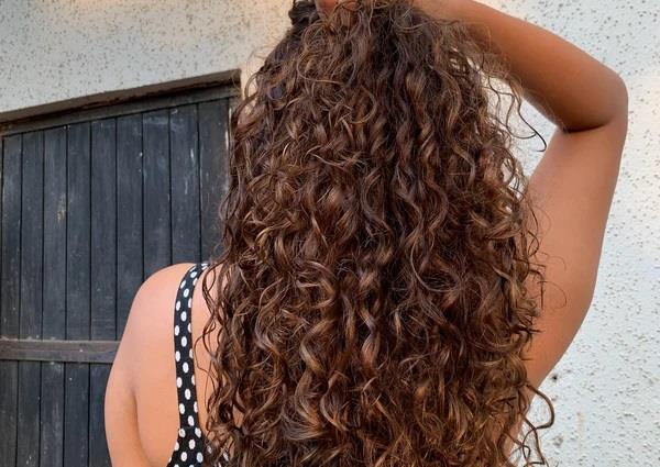 the craze for   curly hair   is growing among young women