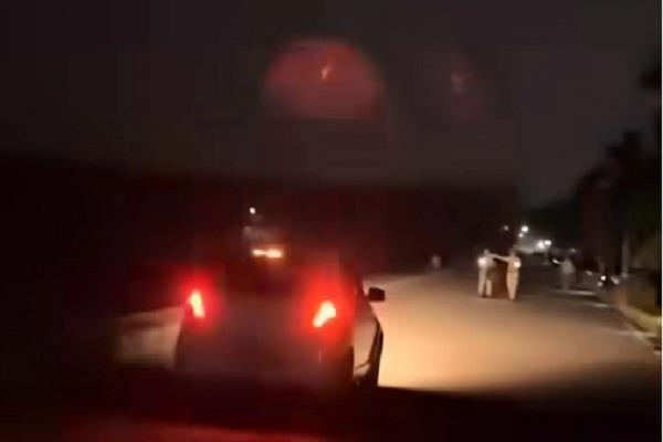 a person drove a car at sukhna lake