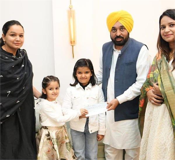 seven and six year sisters donate workshop proceeds to flood victims