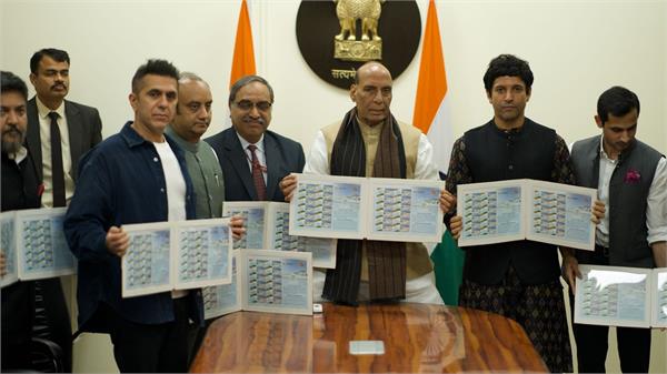 defence minister unveil rezang la memorial stamp