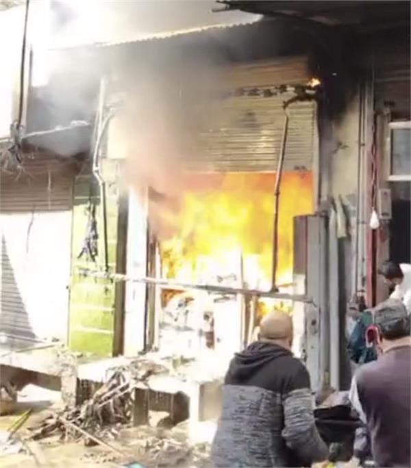 a sudden fire broke out at a general store in the main market of dinanagar