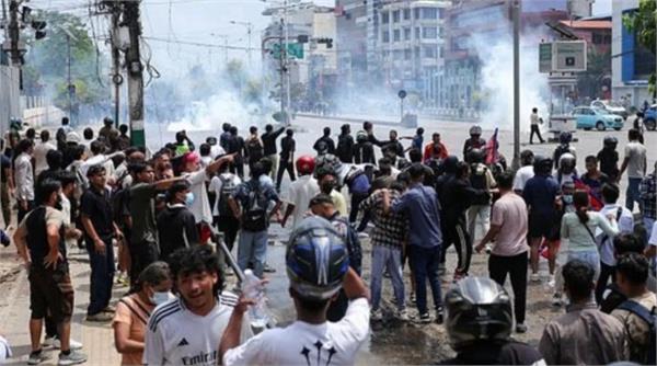 supporters of ousted prime minister oli and   gen z   youth clash