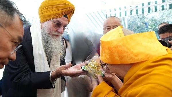 speaker sandhwan meets dalai lama