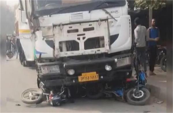 major accident  out of control truck hits several vehicles