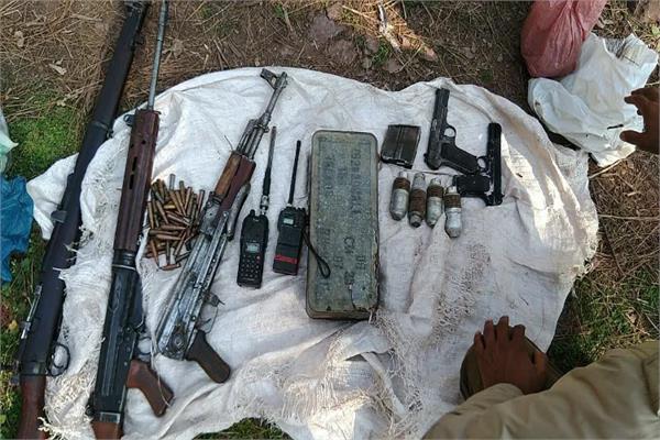 arms and ammunition recovered from a graveyard in srinagar