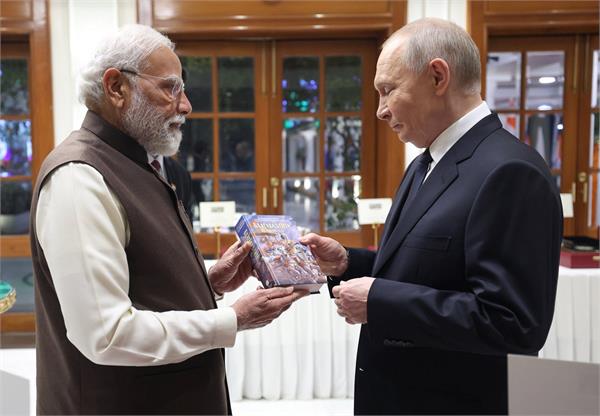 pm modi putin russian language gita copy