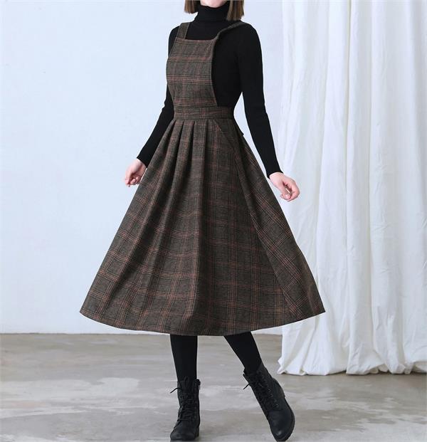 pinafore dresses are giving young girls a cute look