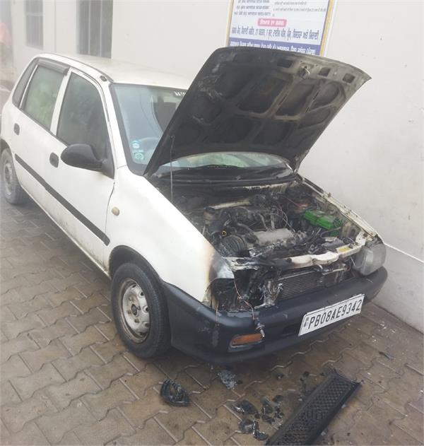 a parked car caught fire 