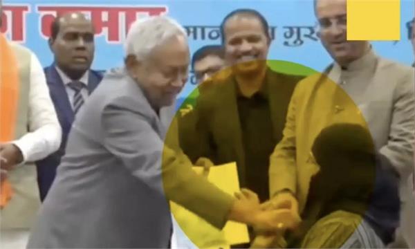 woman removing hijab  apology  cm