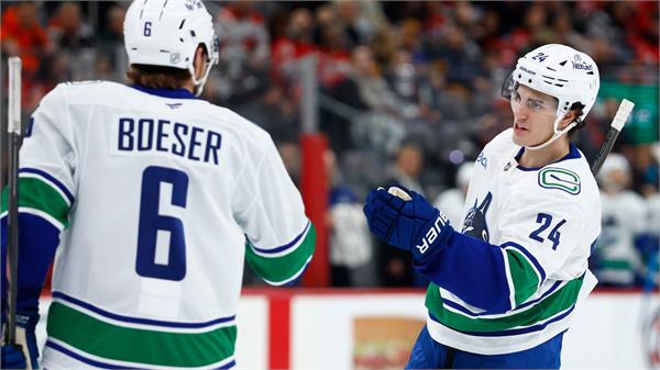 canucks win after kevin hughes trade