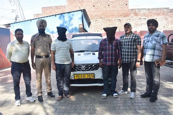 two accused arrested for snatching car