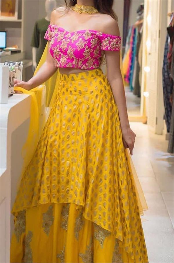 half shoulder lehenga choli are giving a modern look to young women