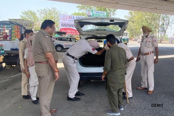 police inspect vehicles during nakas