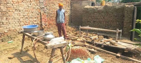 poor elderly family  s mud house collapses due to rain