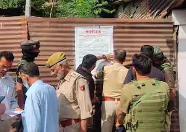 jammu kashmir police confiscated assets of terrorists in valley