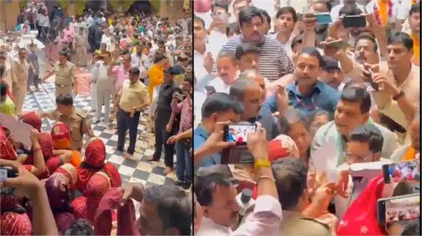 banke bihari corridora minister ak sharma faces protest slogans