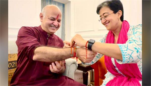 cm atishi ties rakhi to manish sisodia