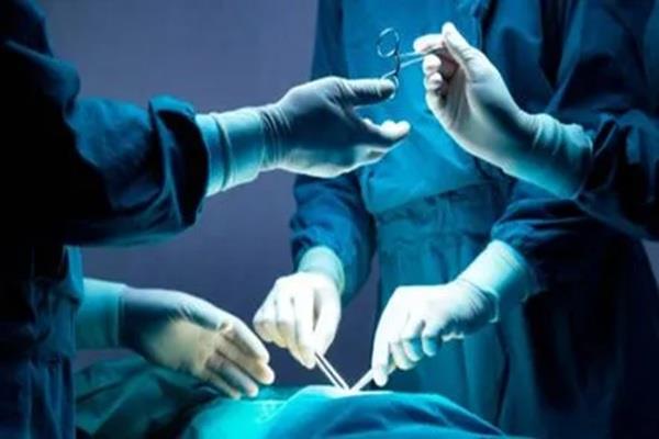 doctor operation woman stomach bandage