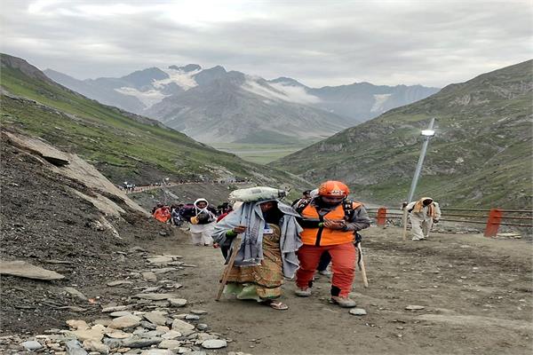 amarnath yatra rain pilgrims jammu kashmir