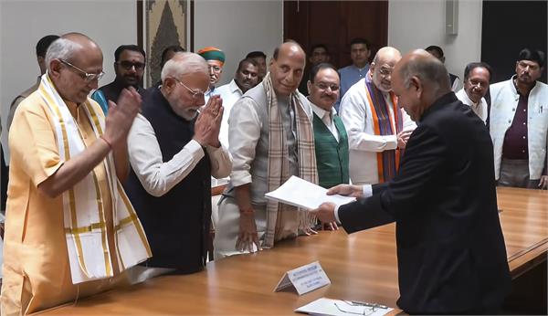 radhakrishnan files nomination papers