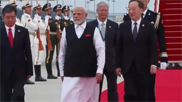 pm modi reaches china after japan  receives grand welcome on red carpet