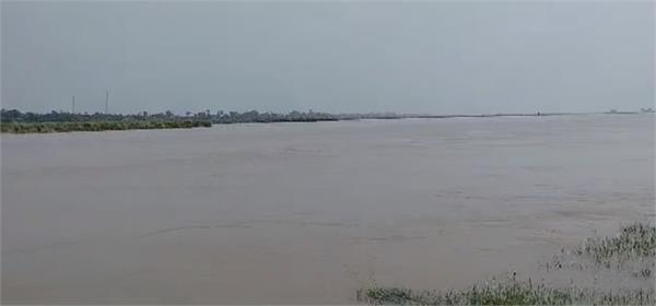 woman beas river