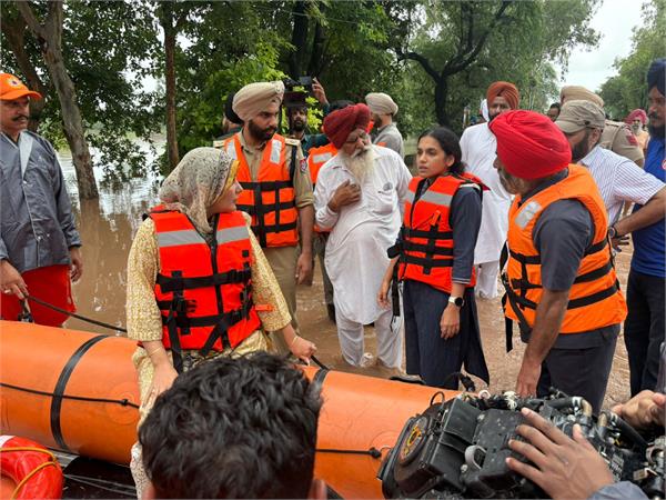 dc sakshi sahni reaches the spot with teams to help amritsar flood victims