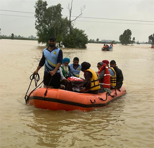 work to evacuate people from flood affected villages continues on a war footing