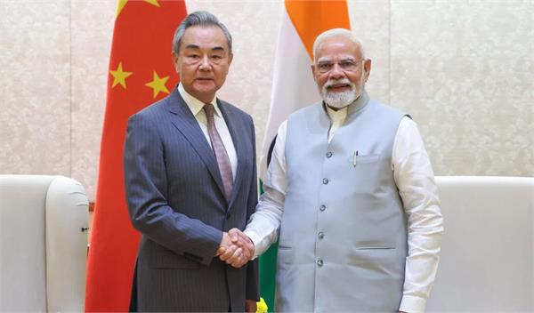 wang yi meet pm modi