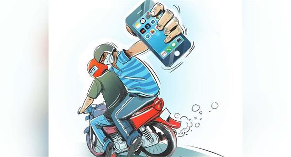 snatching cash  mobile phone and motorcycle from photographer  case registered