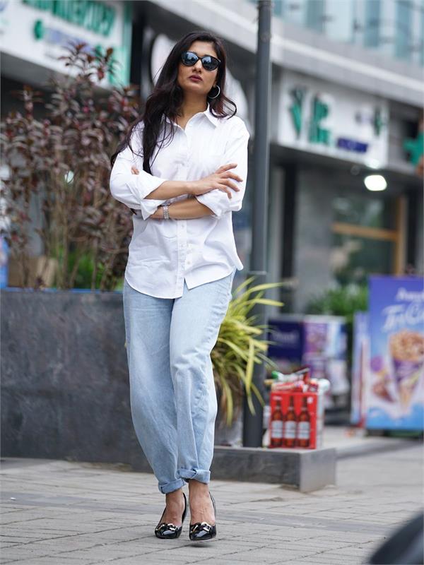 young women white shirts jeans