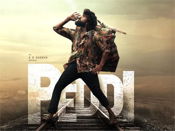 peddi celebrates 18 glorious years mega power star ram charan thrilling poster