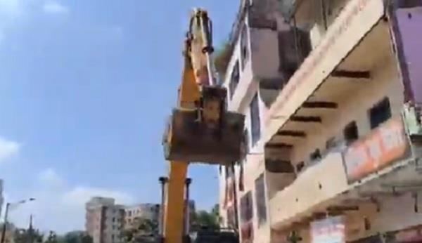 bulldozer hits former olympian muhammad shahid  s house
