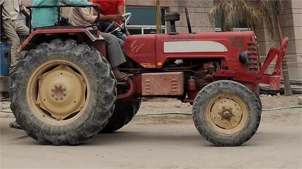 six year old boy dies after being hit by an uncontrolled tractor