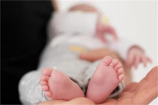 2 twins growing in the stomach of a 30 day old newborn girl