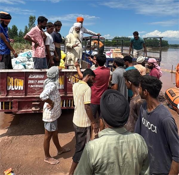 district administration teams distribute relief materials