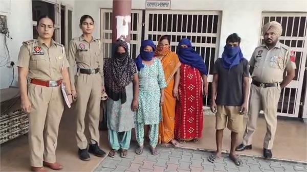 prostitution den busted  4 women and 1 man arrested
