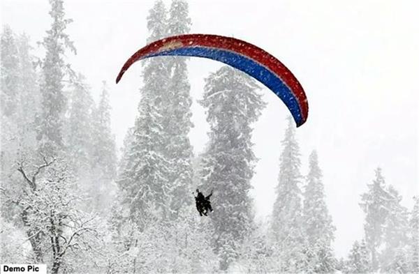 bir billing  flight  paraglider  snowy hills  pilot