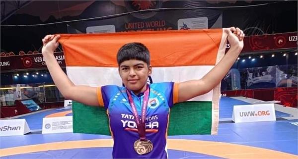 hopes for visa relief for female wrestler