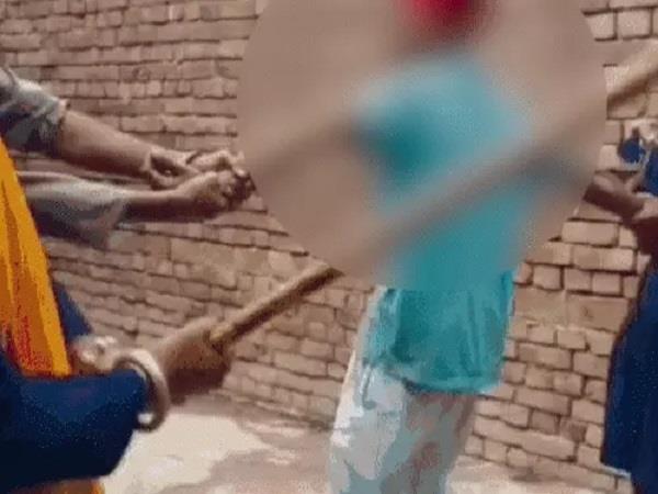 video of nihangs beating up a young man in amritsar