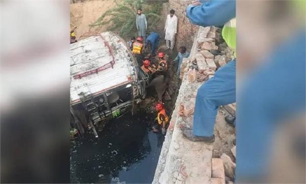bus plunges into drain