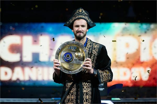 medvedev retains almaty open title