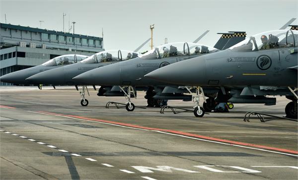 bomb threat received at singapore air base