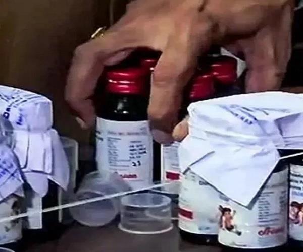 cough syrup  accused  property attachment  police