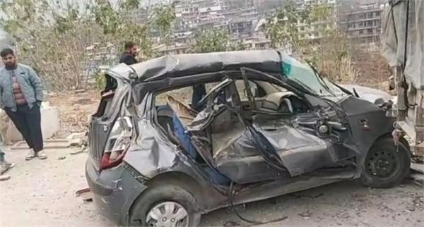 speeding car hits parked truck