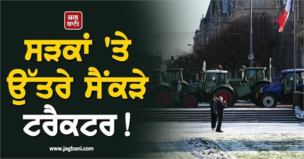 french farmers force their way through paris