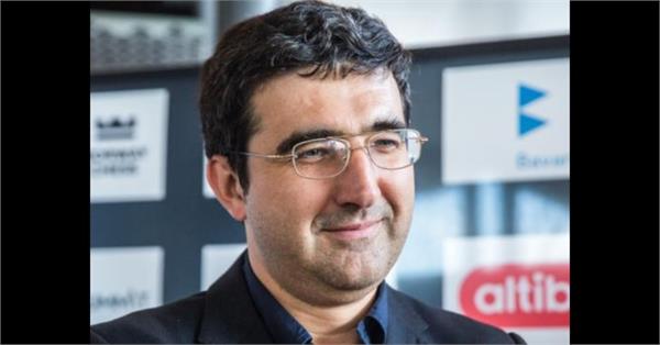 vladimir karamnik files defamation lawsuit against fide