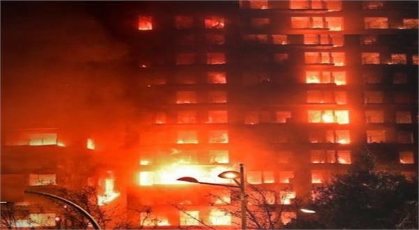 fire breaks out in five storey residential building in barcelona